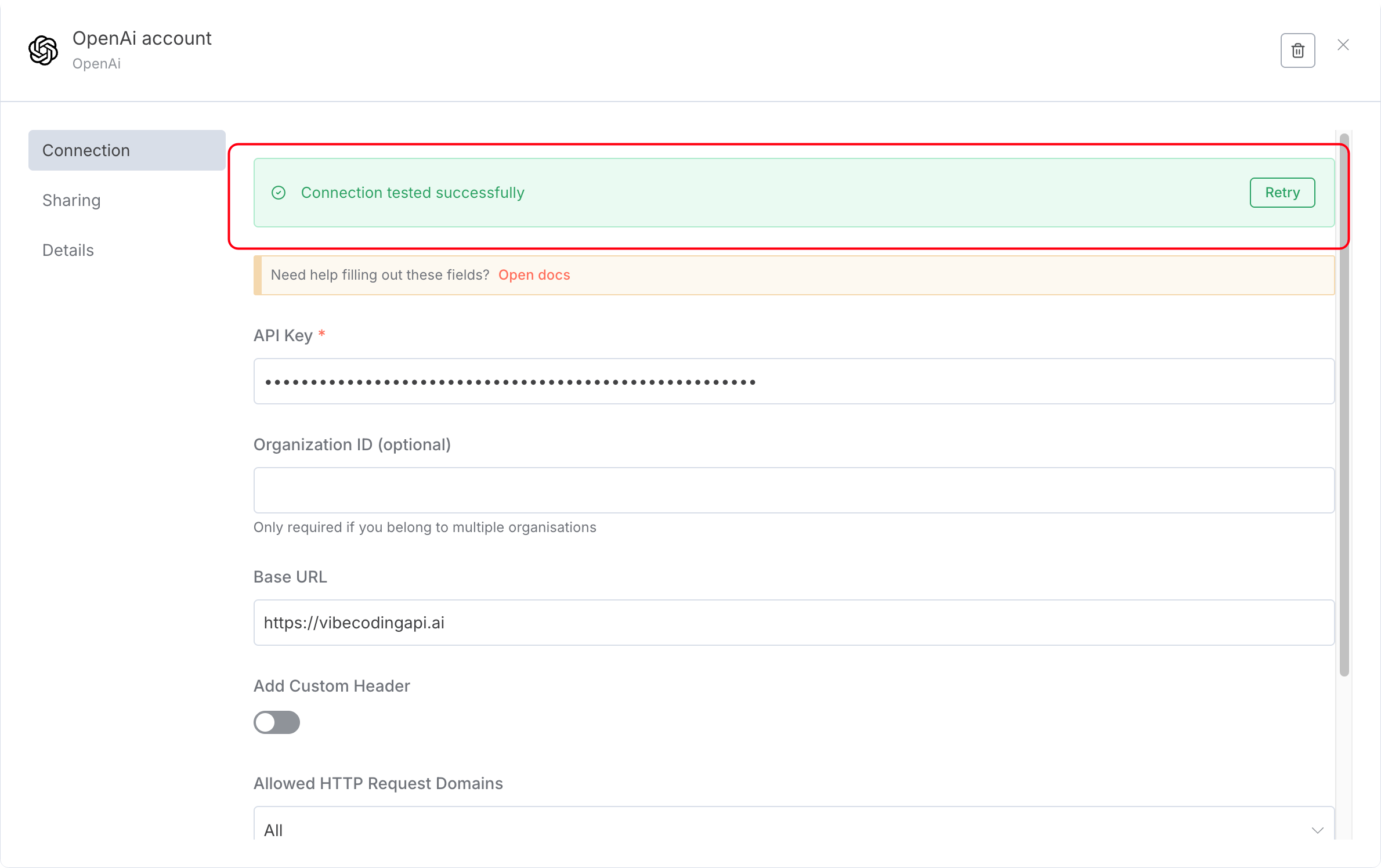 图片展示了VibeCoding API的OpenAI账户连接设置界面。在“Connection”标签下，显示“Connection tested successfully”（连接测试成功），并有“Retry”按钮。下方有“Need help filling out these fields?”（需要帮助填写这些字段？）的提示，以及API Key、Organization ID（可选）、Base URL（默认https://vibecodingapi.ai）等输入框。其中Base URL已填写，API Key处显示为星号遮挡。该图片与文档中n8n工作流设置部分内容相关，用于说明在n8n中设置OpenAI账户连接时的界面及部分设置情况。