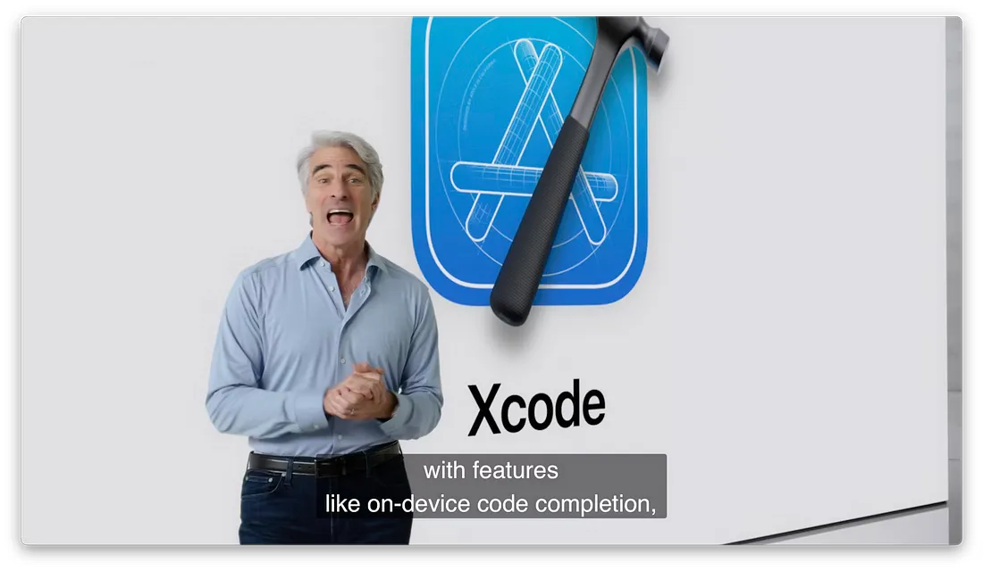图片展示了一位男士站在Xcode图标前，图标上有蓝色背景和锤子图案。画面右侧有“Xcode”字样，下方文字写着“with features like on-device code completion”。男士表情生动，似乎在介绍相关内容。该图片与上下文紧密相关，上下文提到Xcode可以使用设备上的Apple Intelligence来执行设备上的代码，此图直观呈现了Xcode这一开发工具，辅助说明其功能特点。